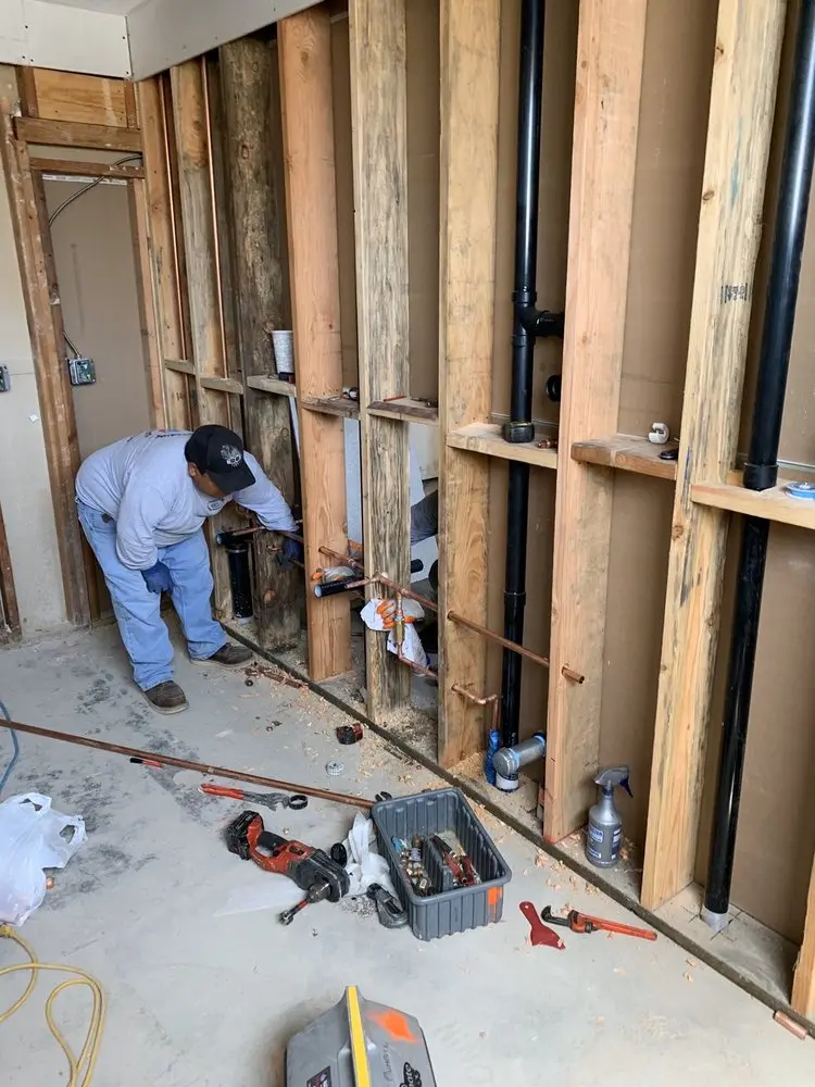 Commercial rough-in plumbing for Water Heater Replacement in Newport